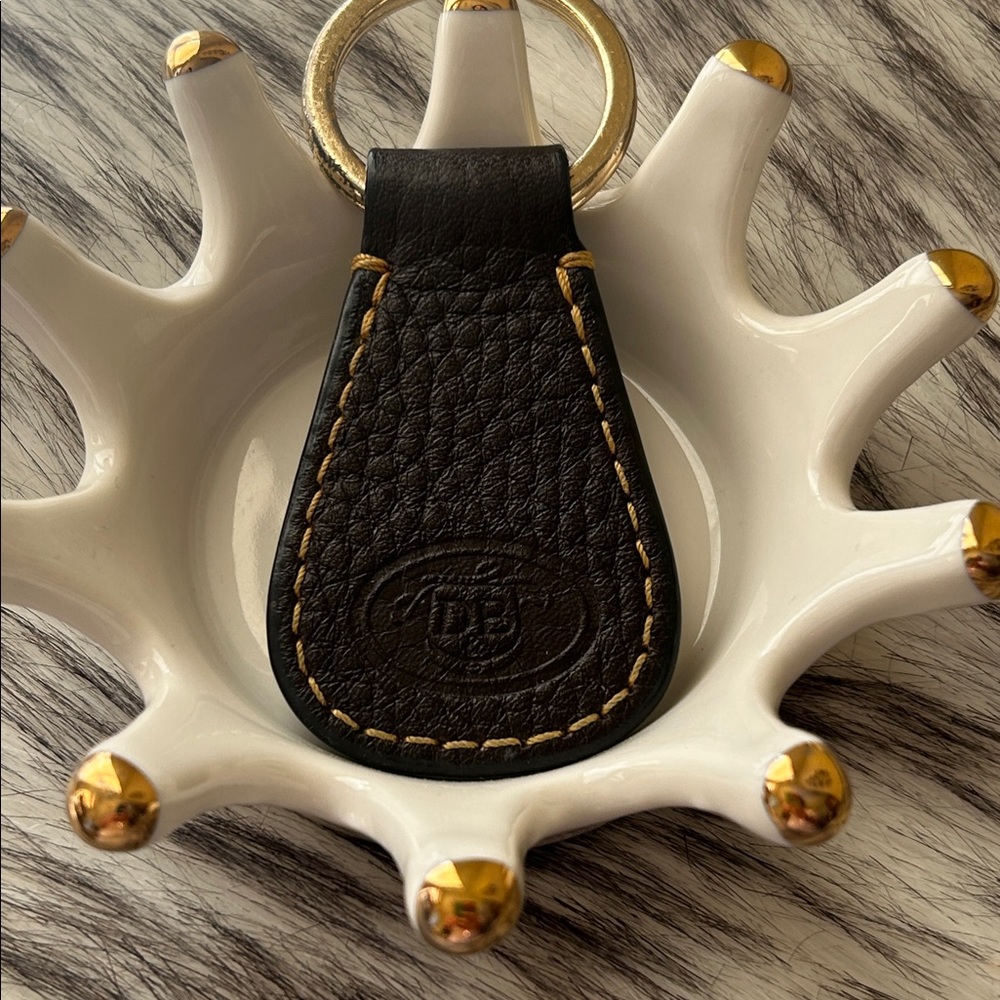 Dooney and Bourke, dark brown pebble leather fob